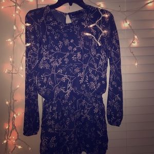 This is a gently used, 3 time-worn stylish romper!